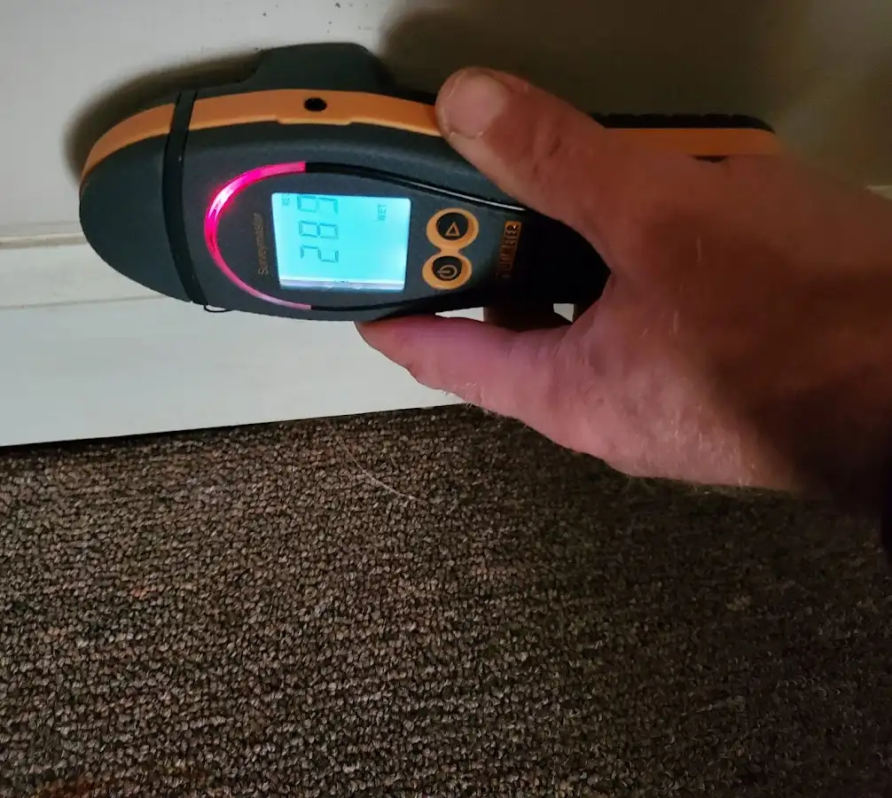 Moisture detection at baseboard during Storm Damage Restoration in Chehalis